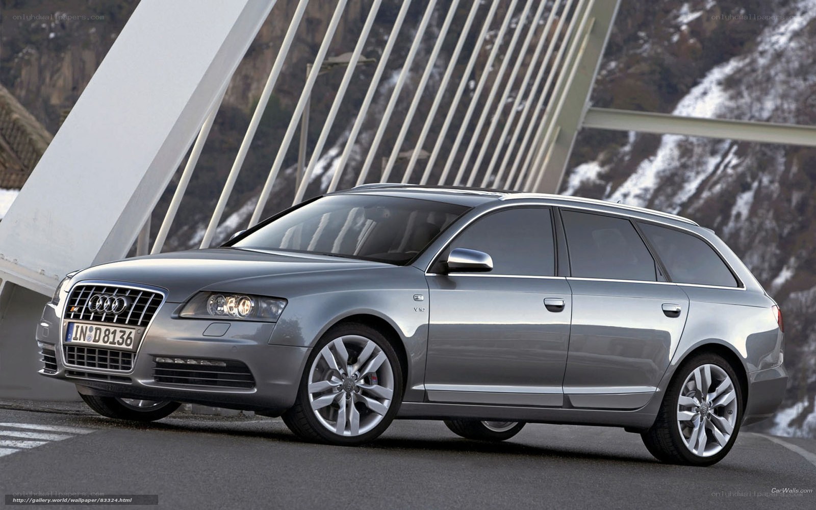Silver Audi A6 Avant on a bridge