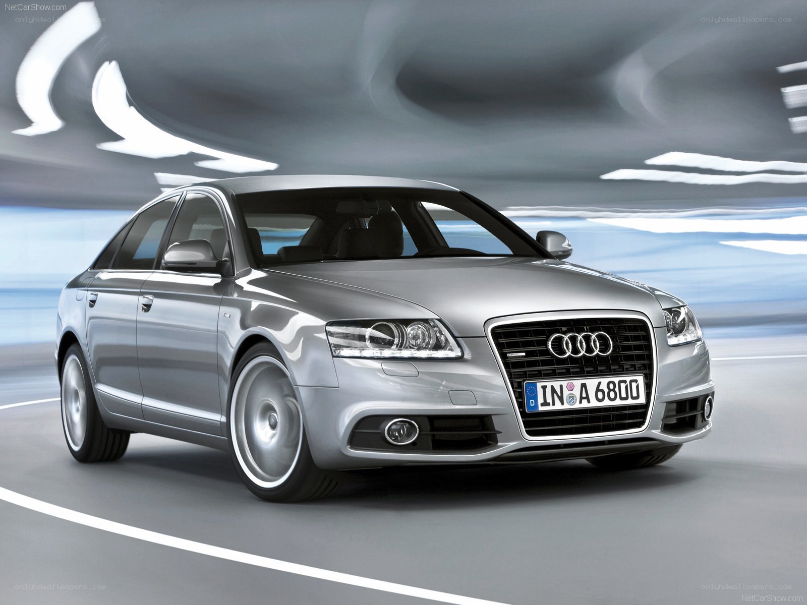 silver audi a6 in motion