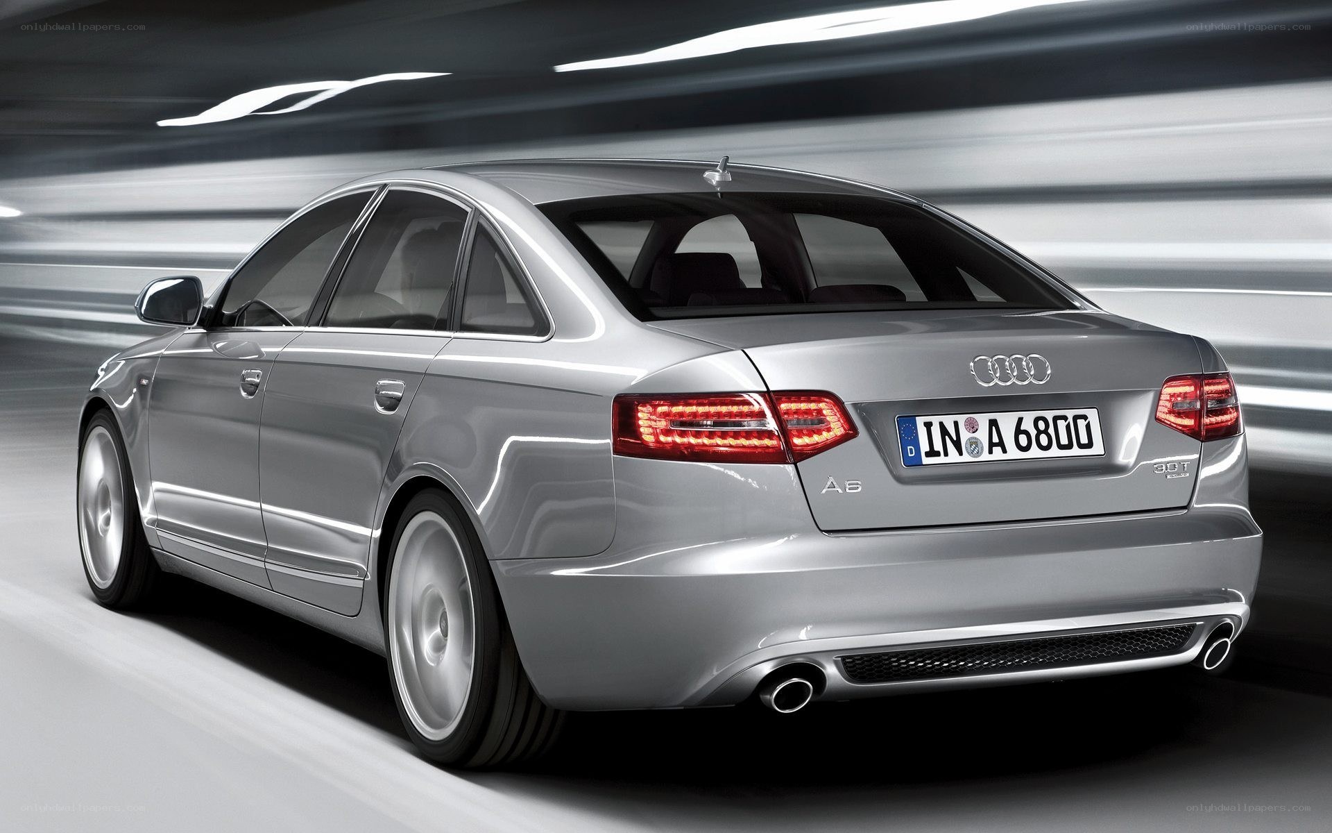 silver audi a6 in motion