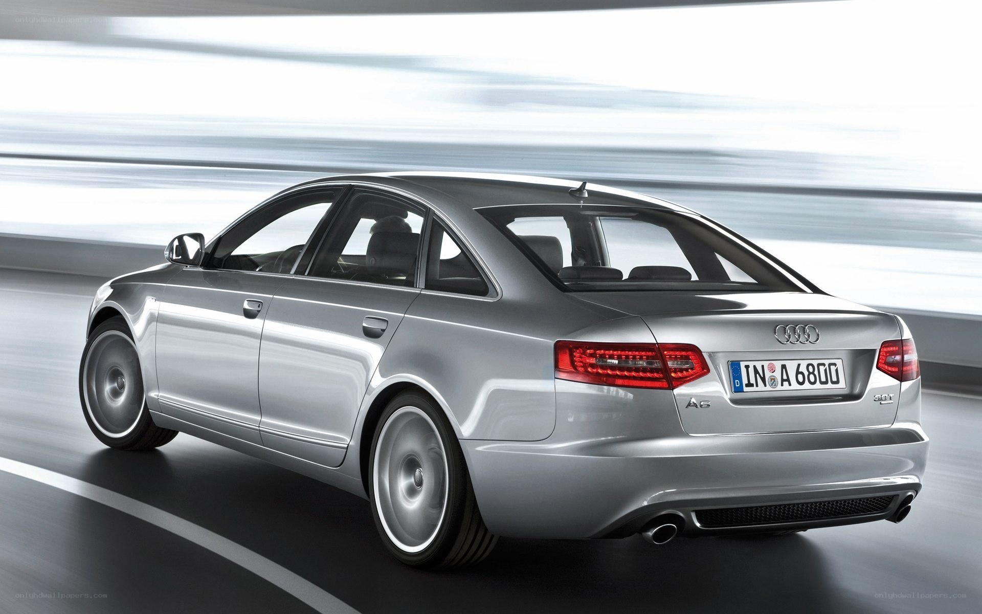 silver audi a6 in motion