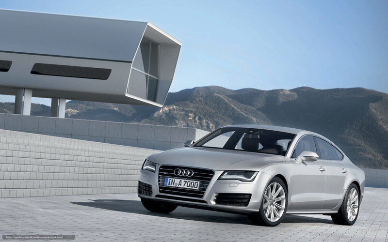 Silver Audi A7 in modern setting