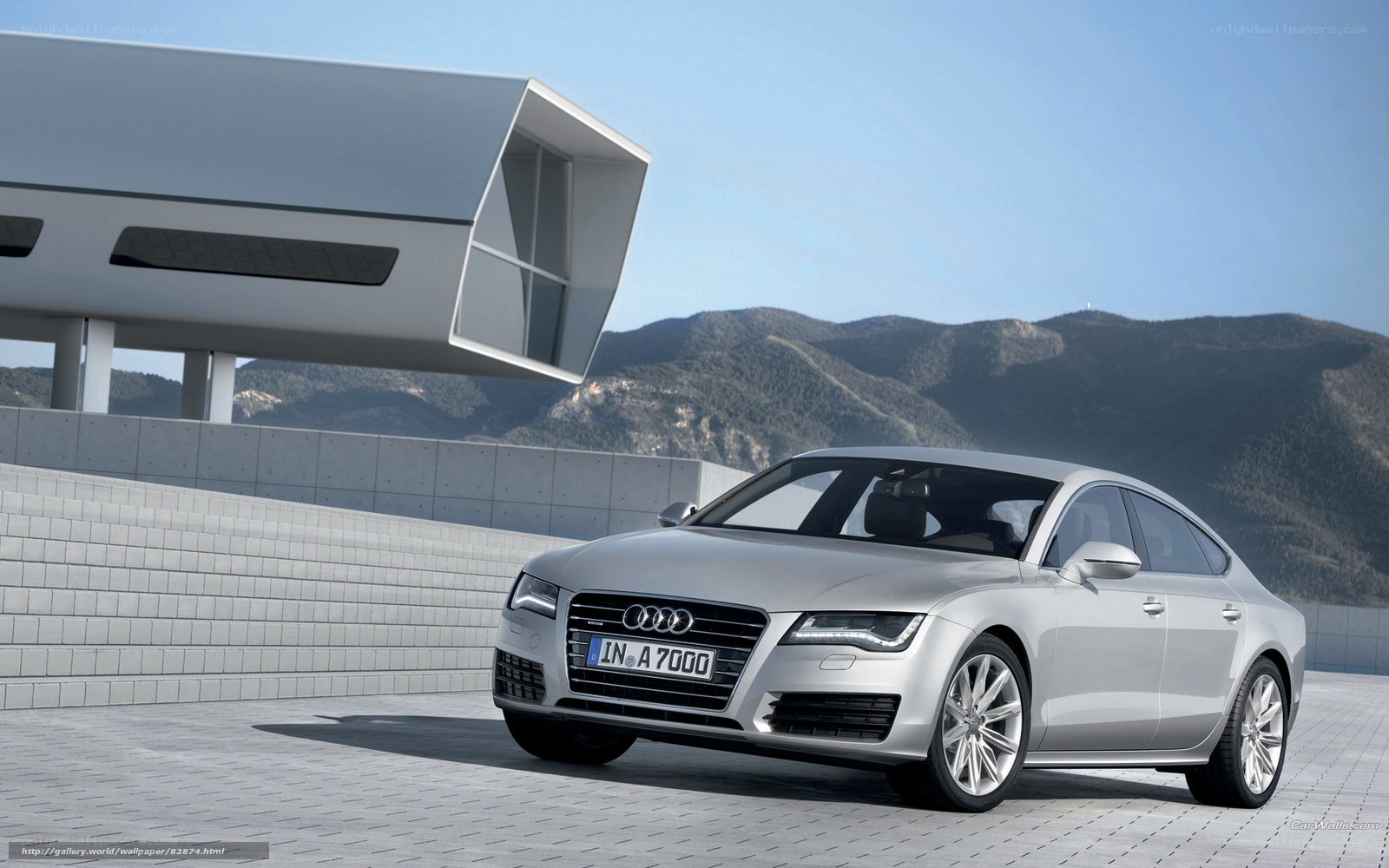 Silver Audi A7 in modern setting