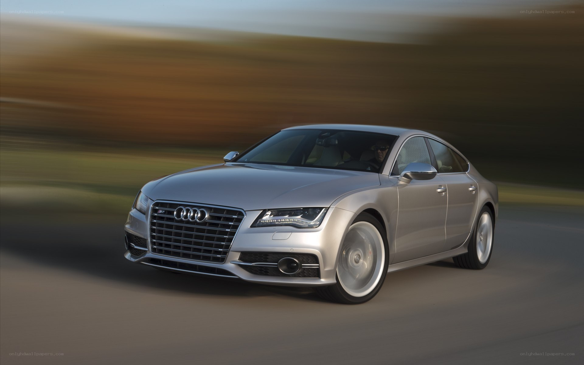 Silver Audi A7 in motion