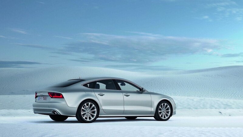 Silver Audi A7 in snowy landscape