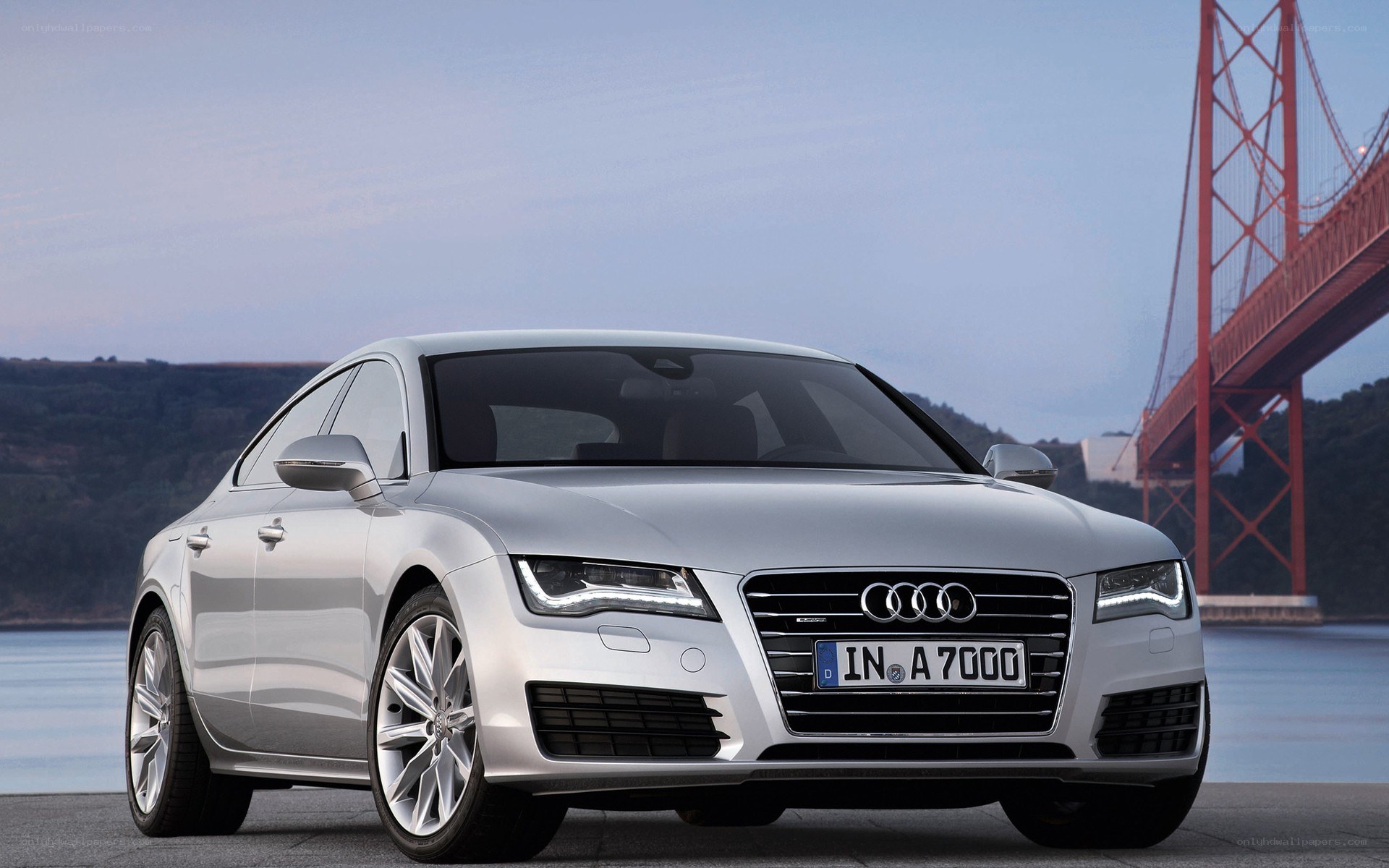 Silver Audi A7 near a bridge