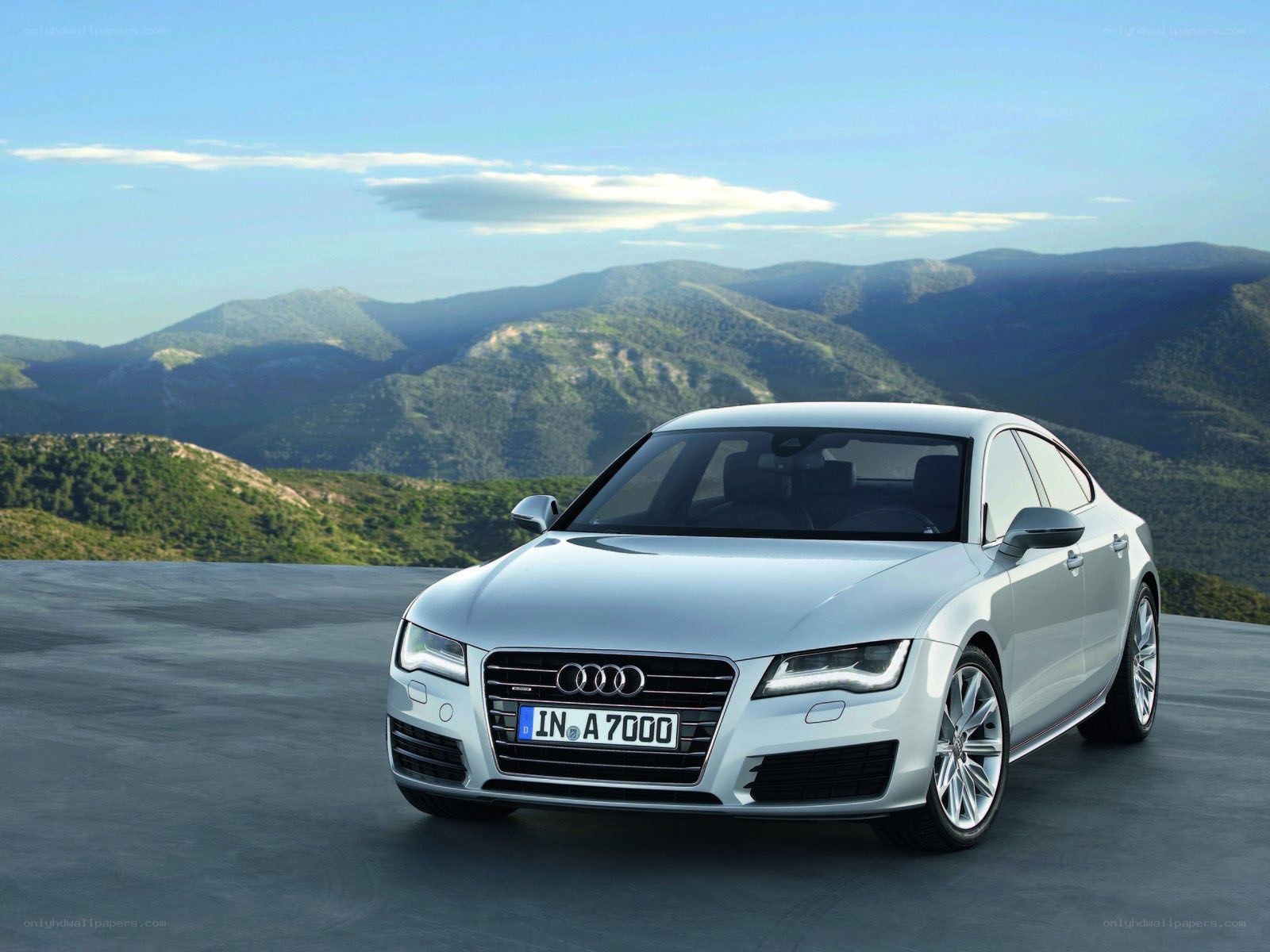 Silver Audi A7 on mountain road