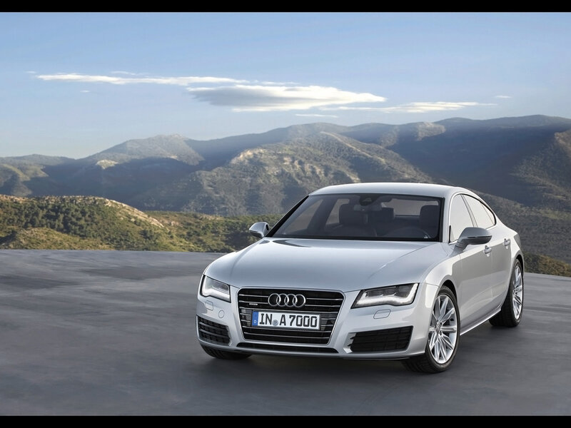 Silver Audi A7 on mountain road