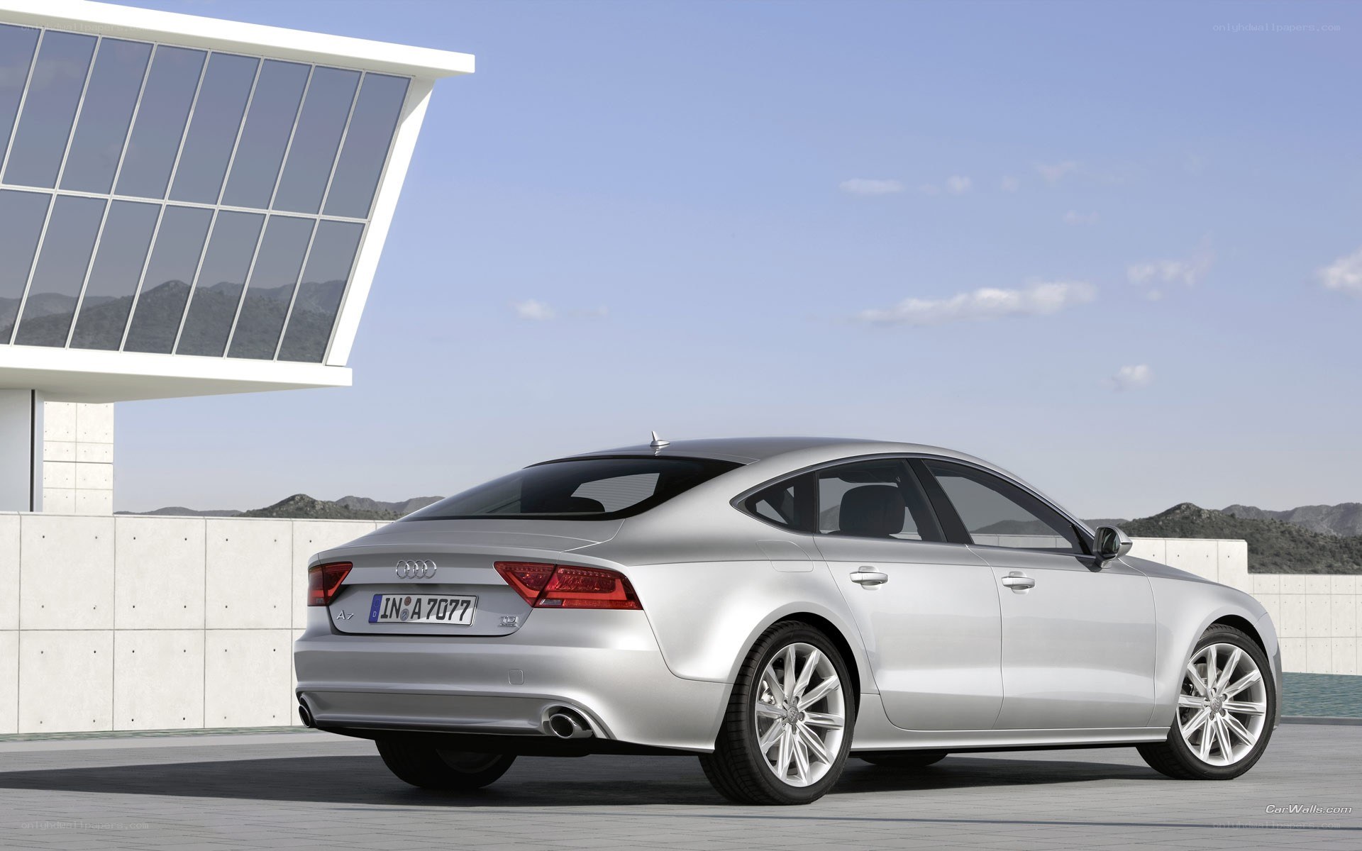 Silver Audi A7 parked outside