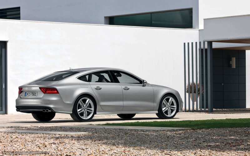 Silver Audi A7 Sedan — Serene, Afternoon, Photograph, Modern House