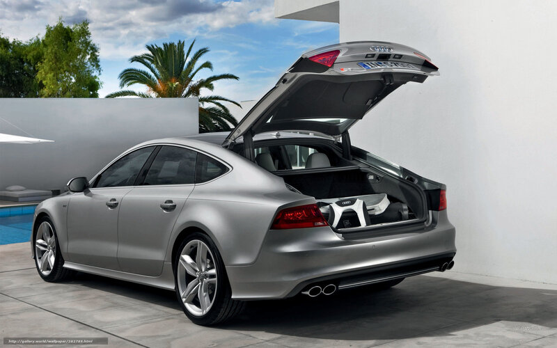 Silver Audi A7 with open trunk