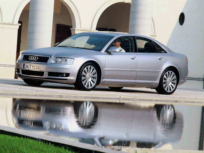 Silver Audi A8 by a pool
