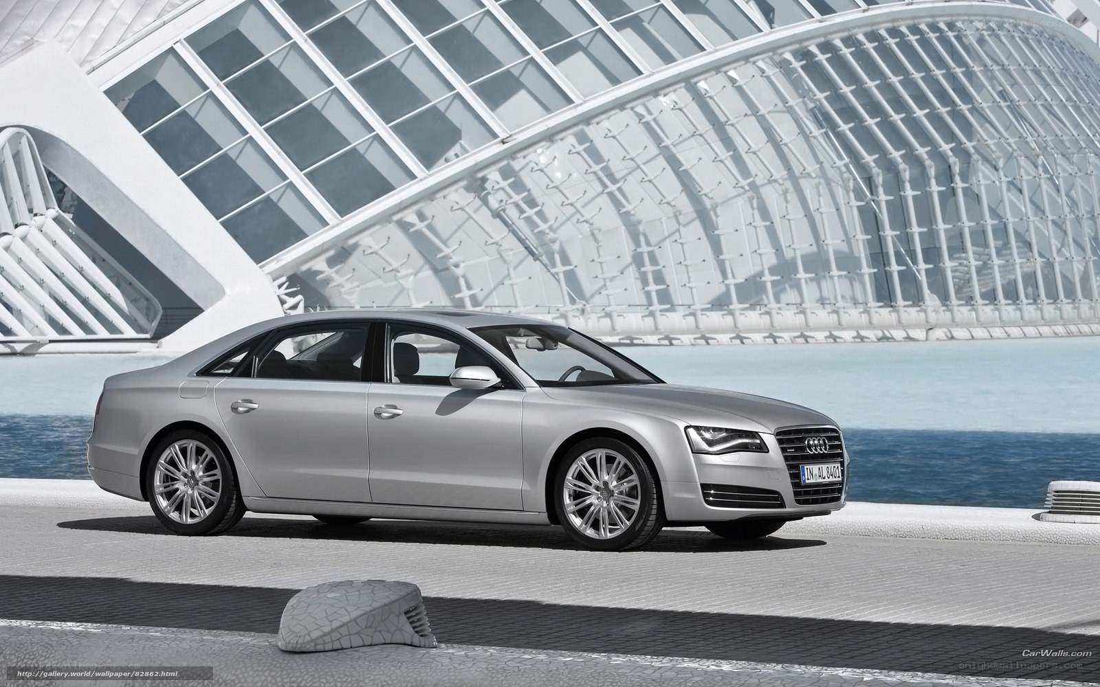 Silver Audi A8 by modern architecture