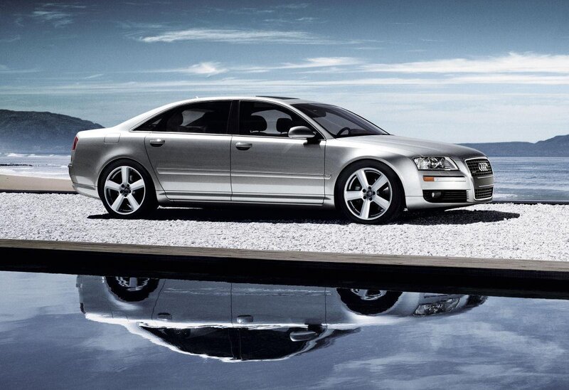 Silver Audi A8 by the sea
