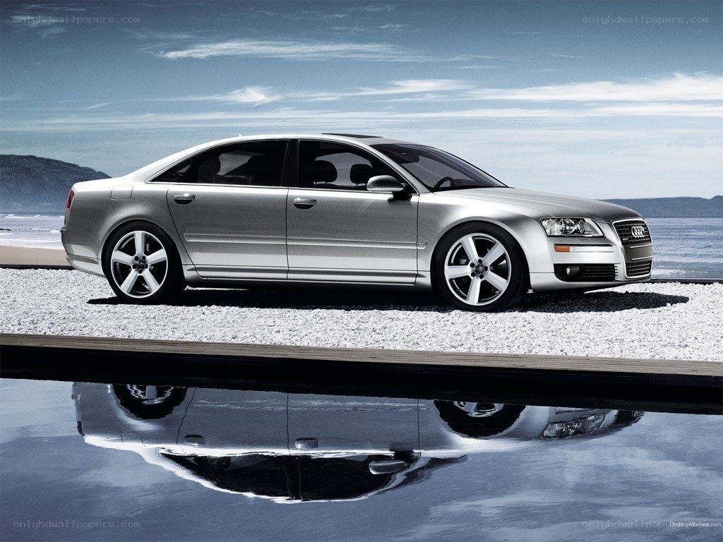Silver Audi A8 by the water
