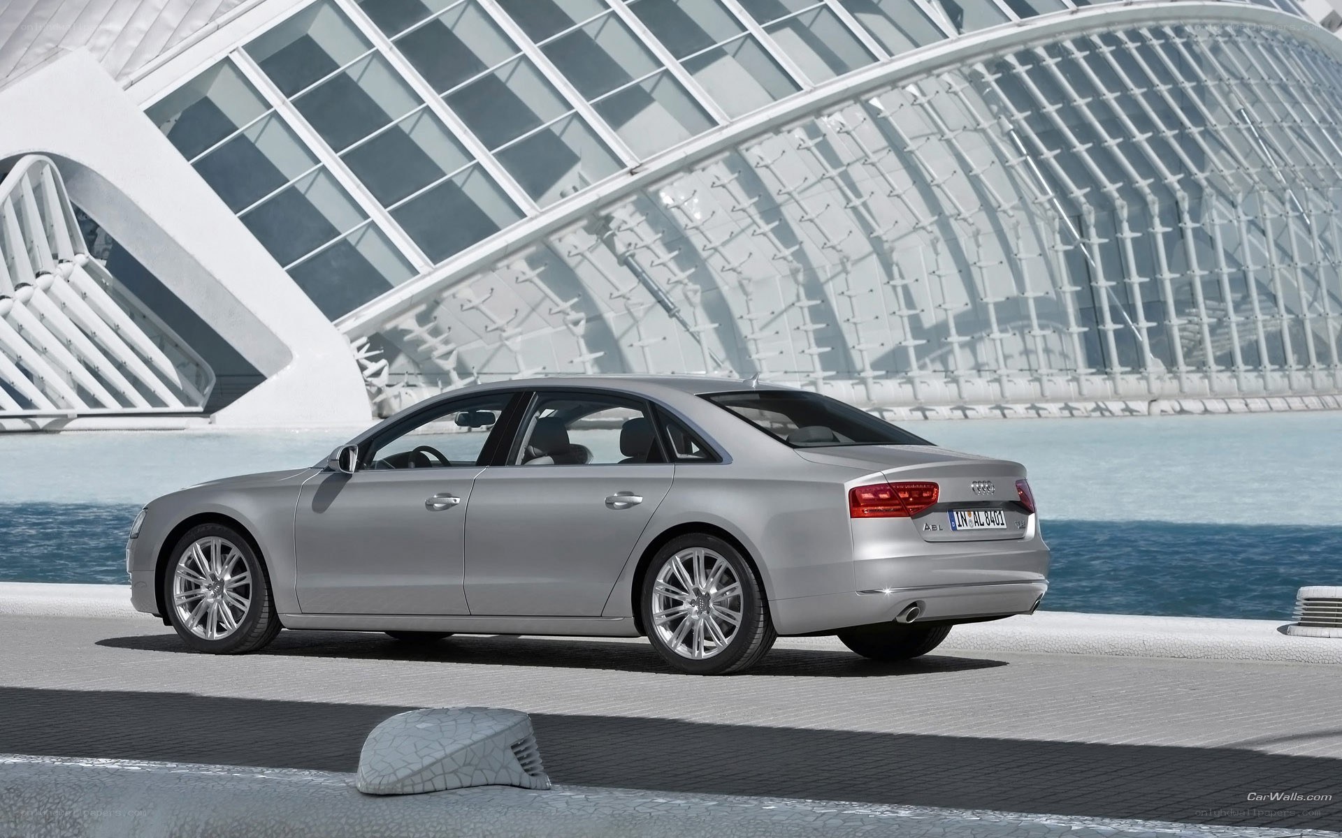 Silver Audi A8 by waterfront