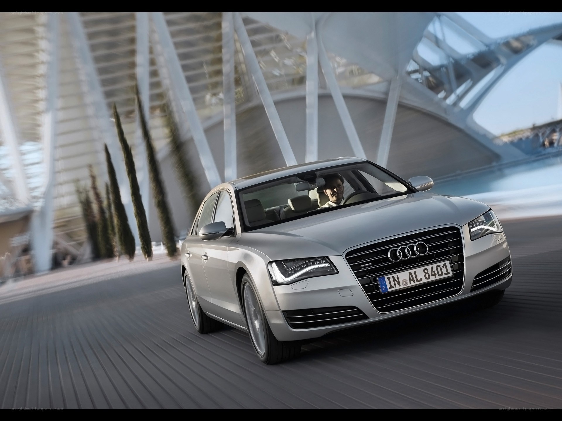Silver Audi A8 driving on road