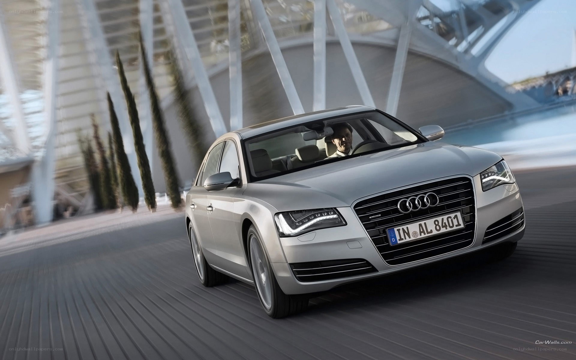 silver audi a8 driving on road