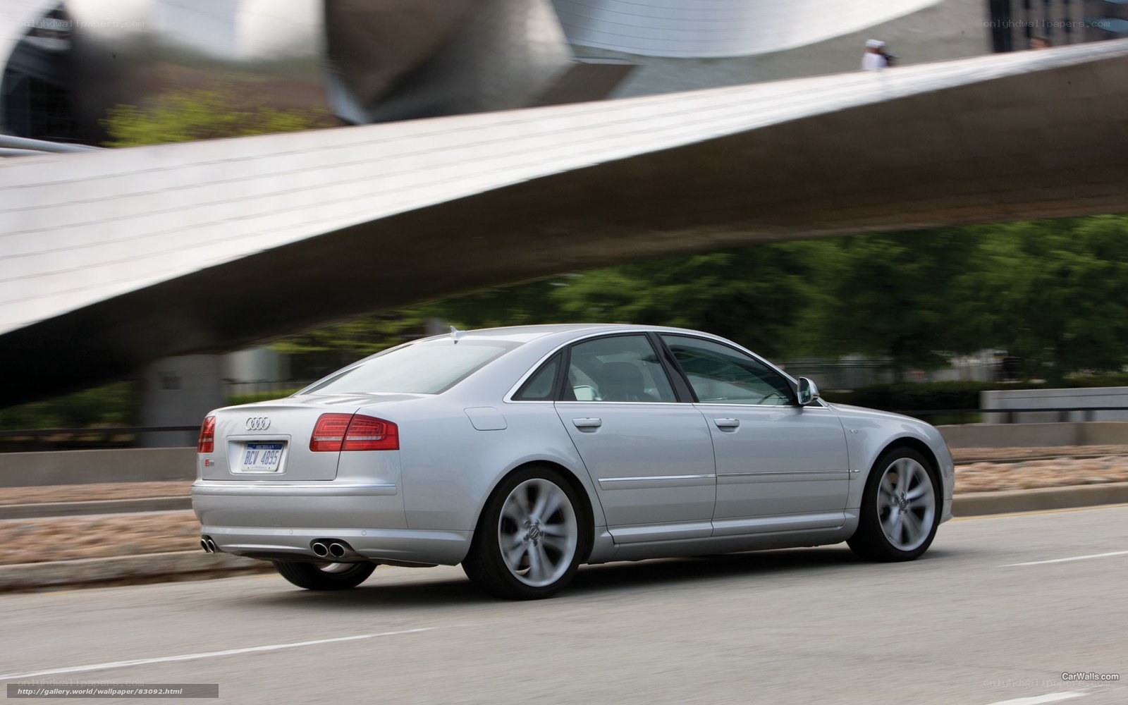 silver audi a8 driving on road
