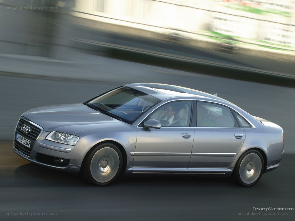 silver audi a8 in motion
