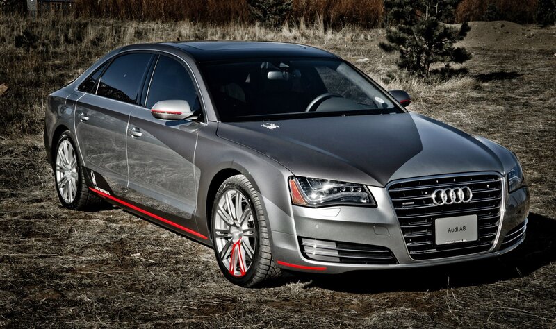 Silver Audi A8 on grass