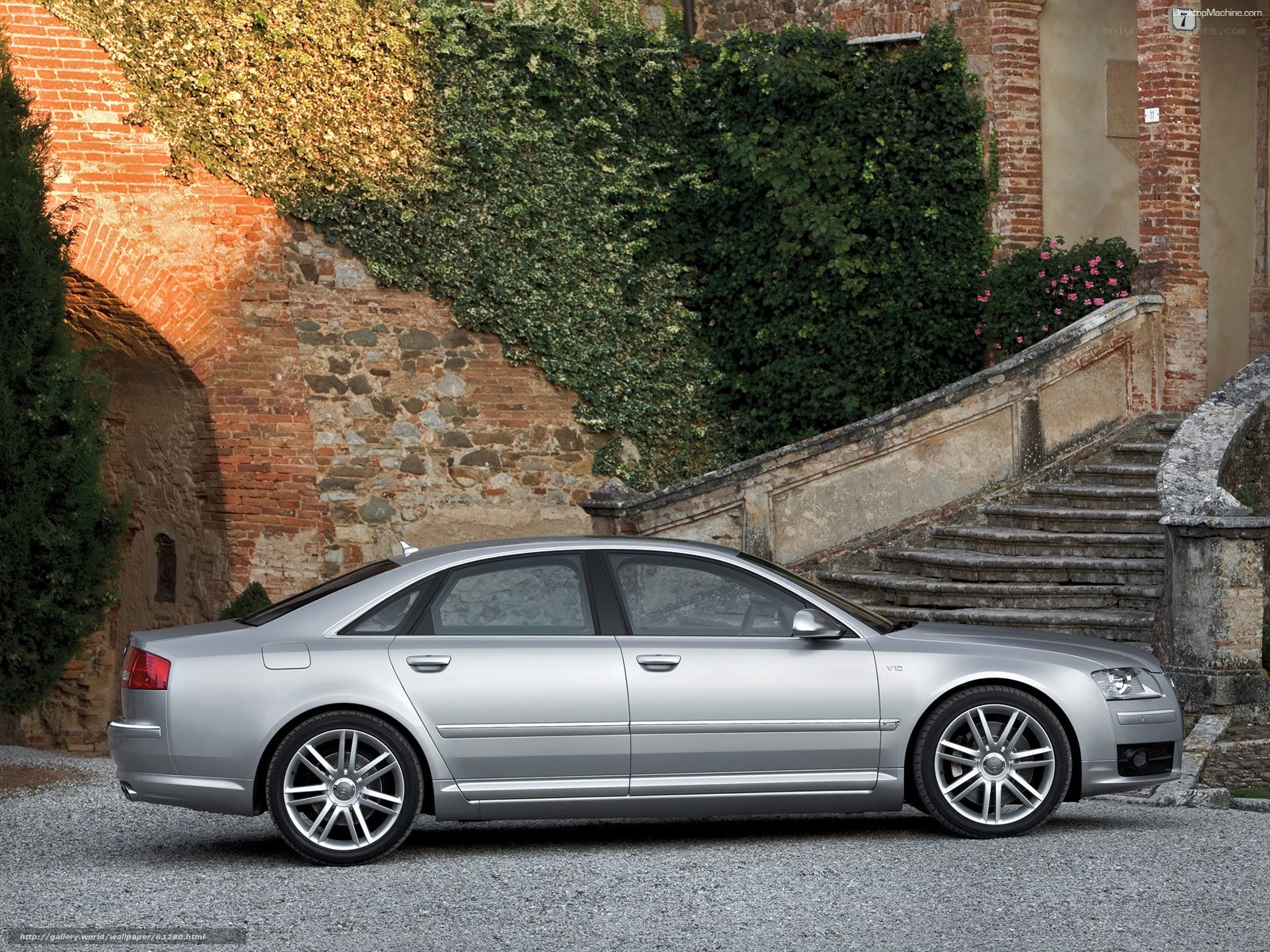 silver audi a8 parked by stone stairs