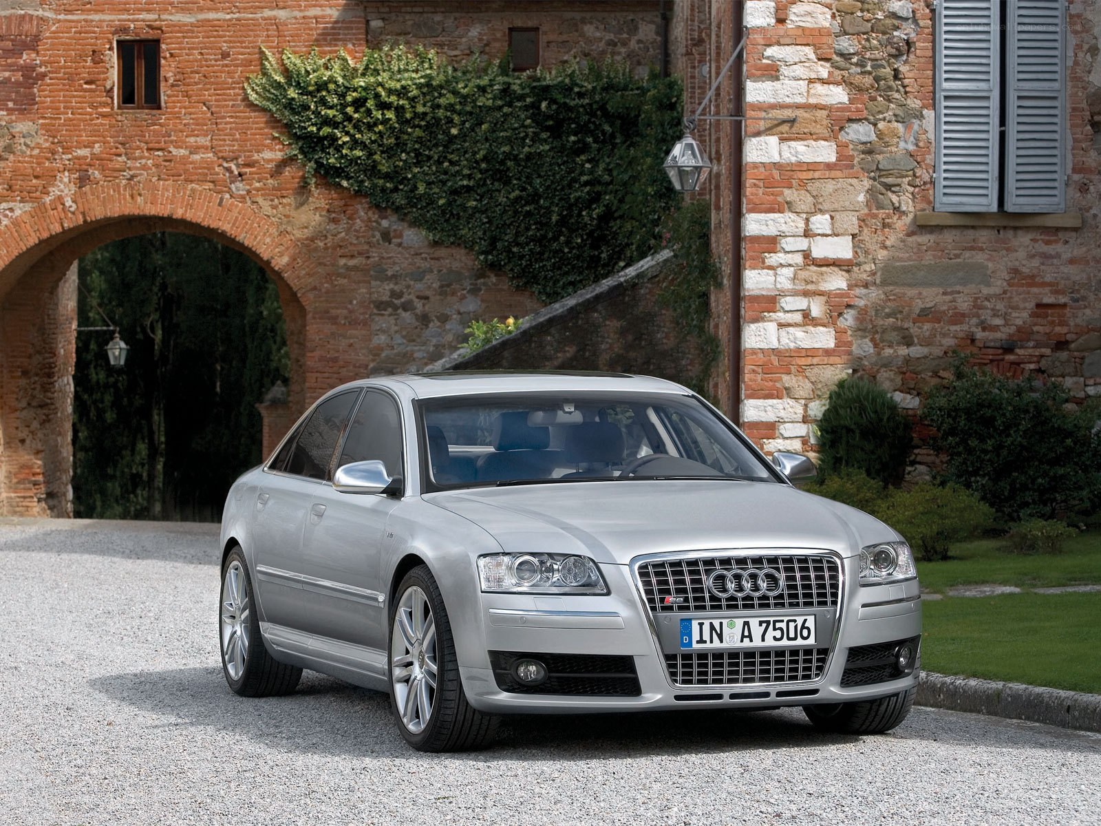 Silver Audi A8 parked in courtyard