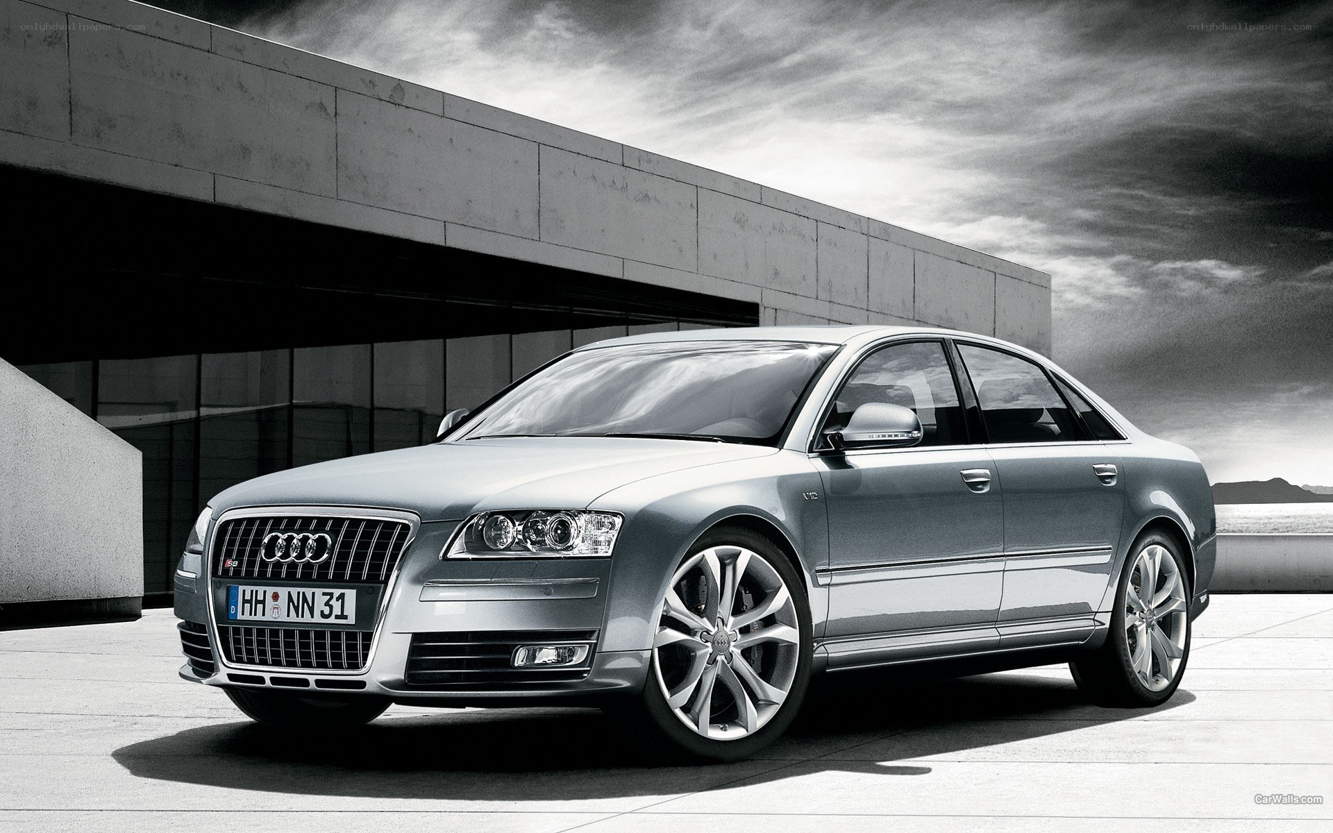 Silver Audi A8 parked outside