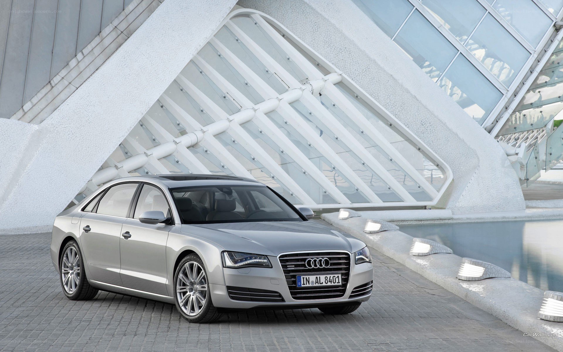 Silver Audi A8 parked outside