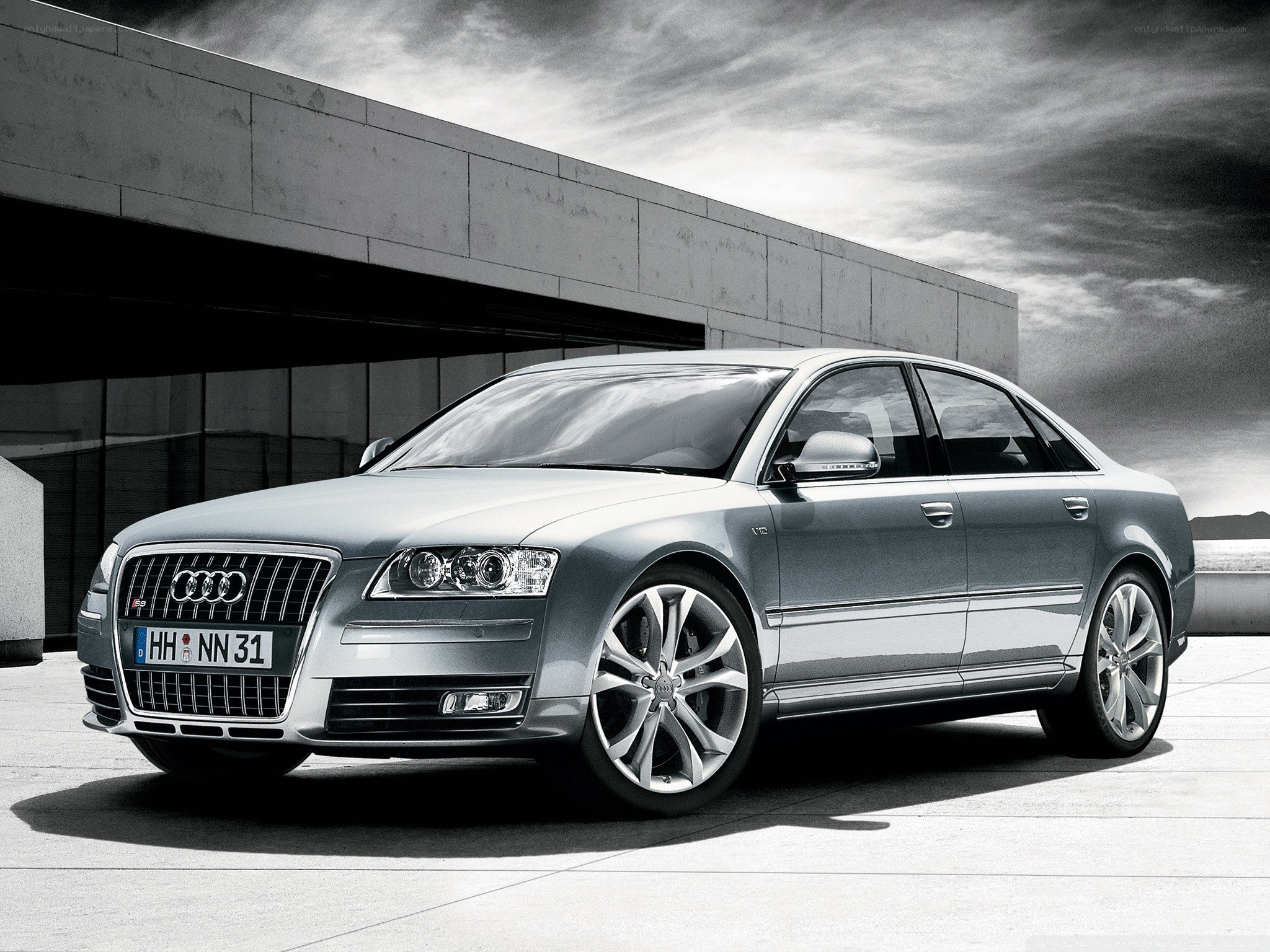 Silver Audi A8 parked outside