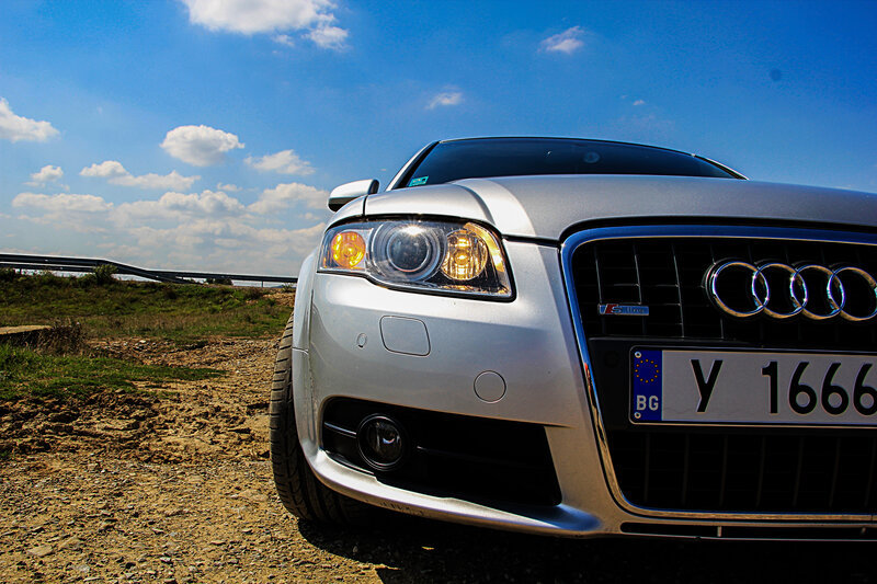Silver Audi Car — Blue, Dramatic