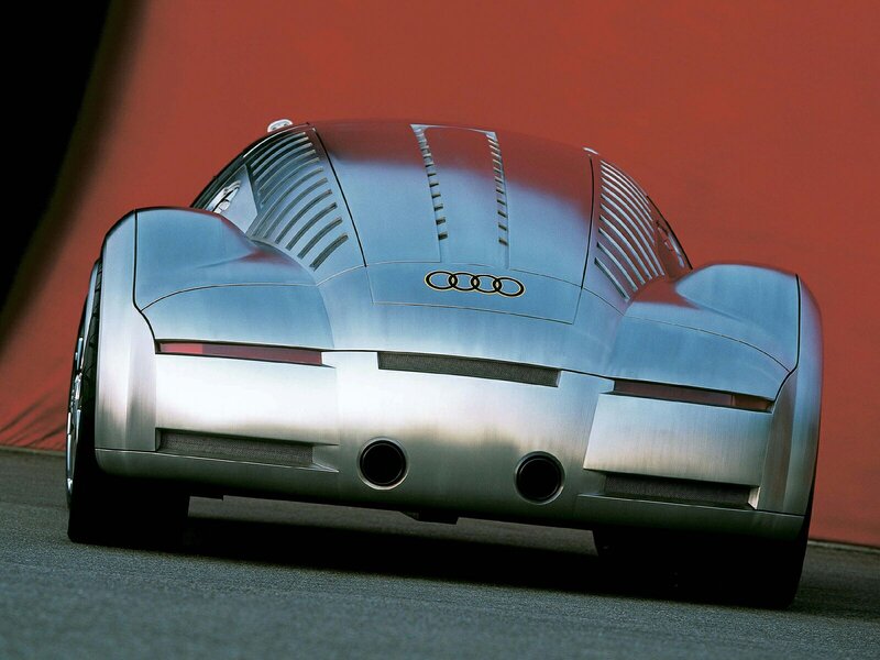Silver Audi Concept Car — Dramatic, Photograph, Red Wall