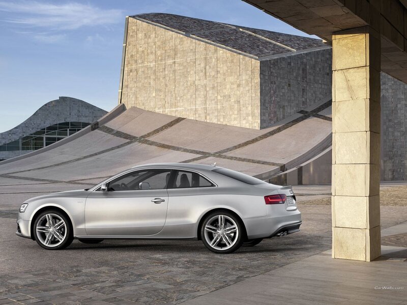 Silver Audi coupe in modern setting