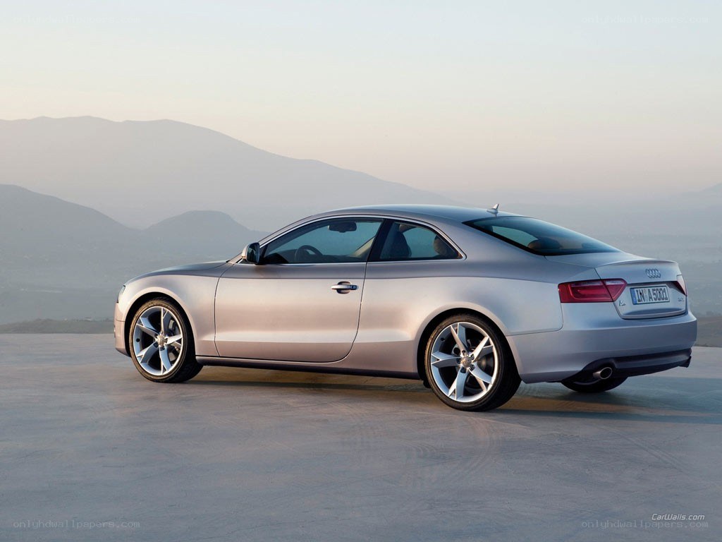 silver audi coupe on a hill
