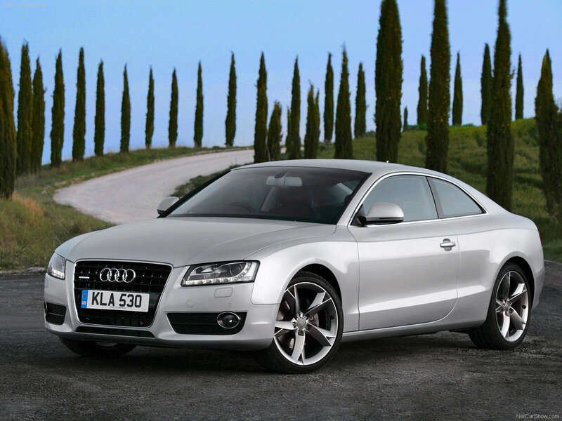 silver audi coupe on country road
