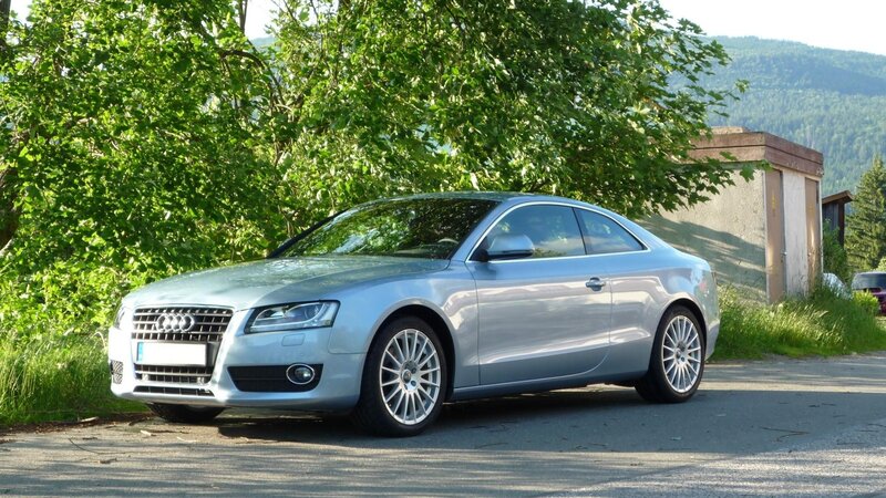 silver audi coupe parked outdoors