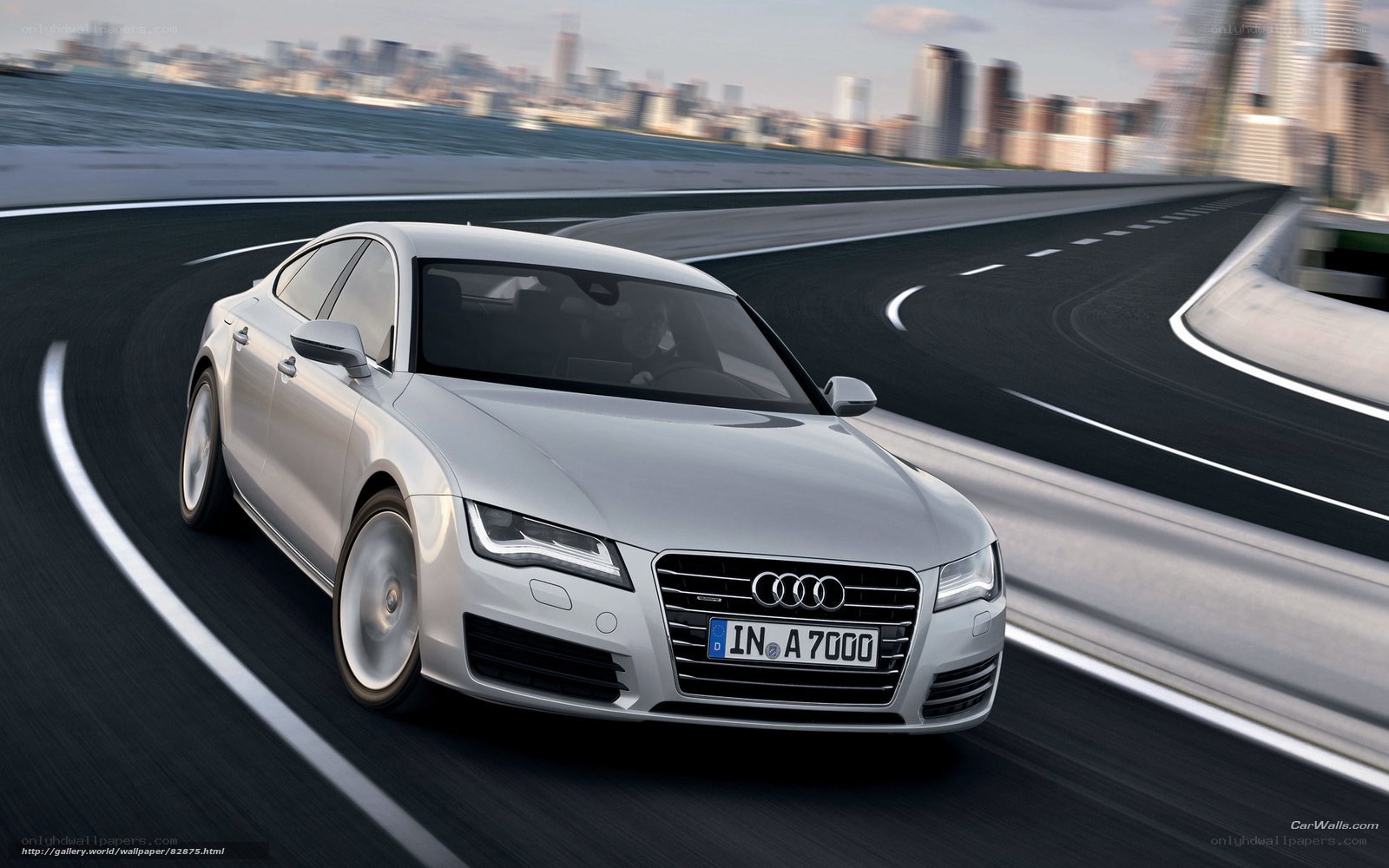 Silver Audi driving on a highway