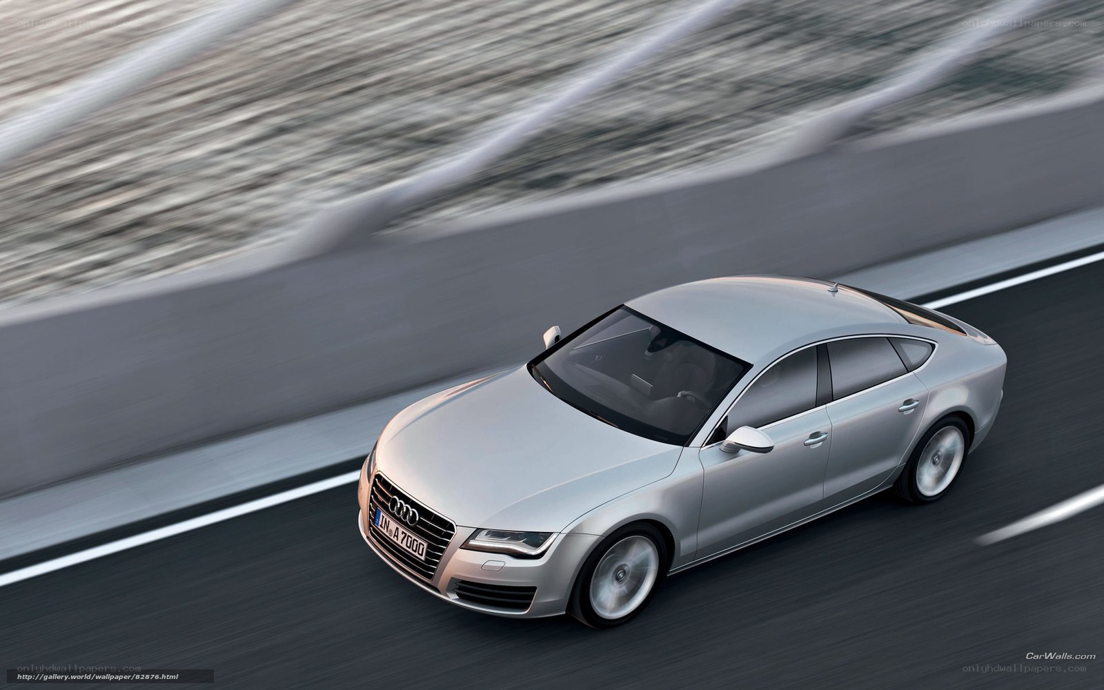 silver audi driving on road