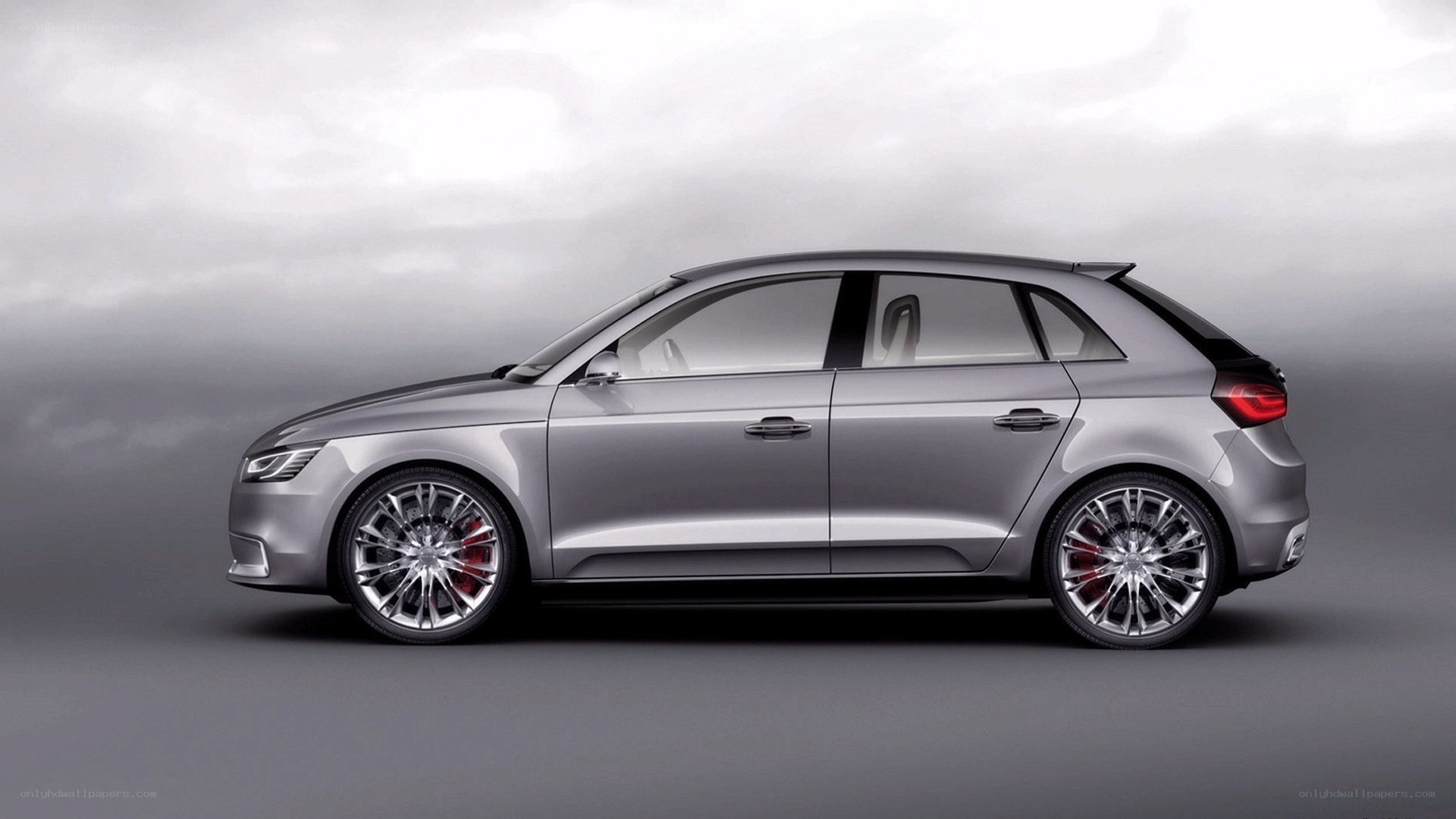 silver audi hatchback car