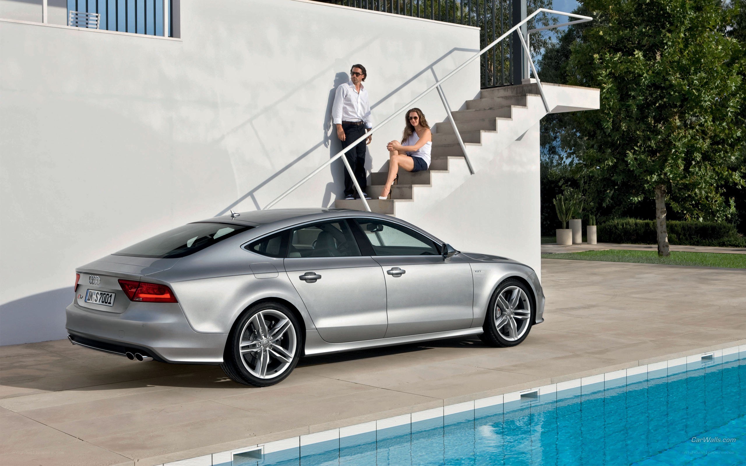 Silver Audi near pool