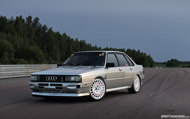 silver audi on a racetrack
