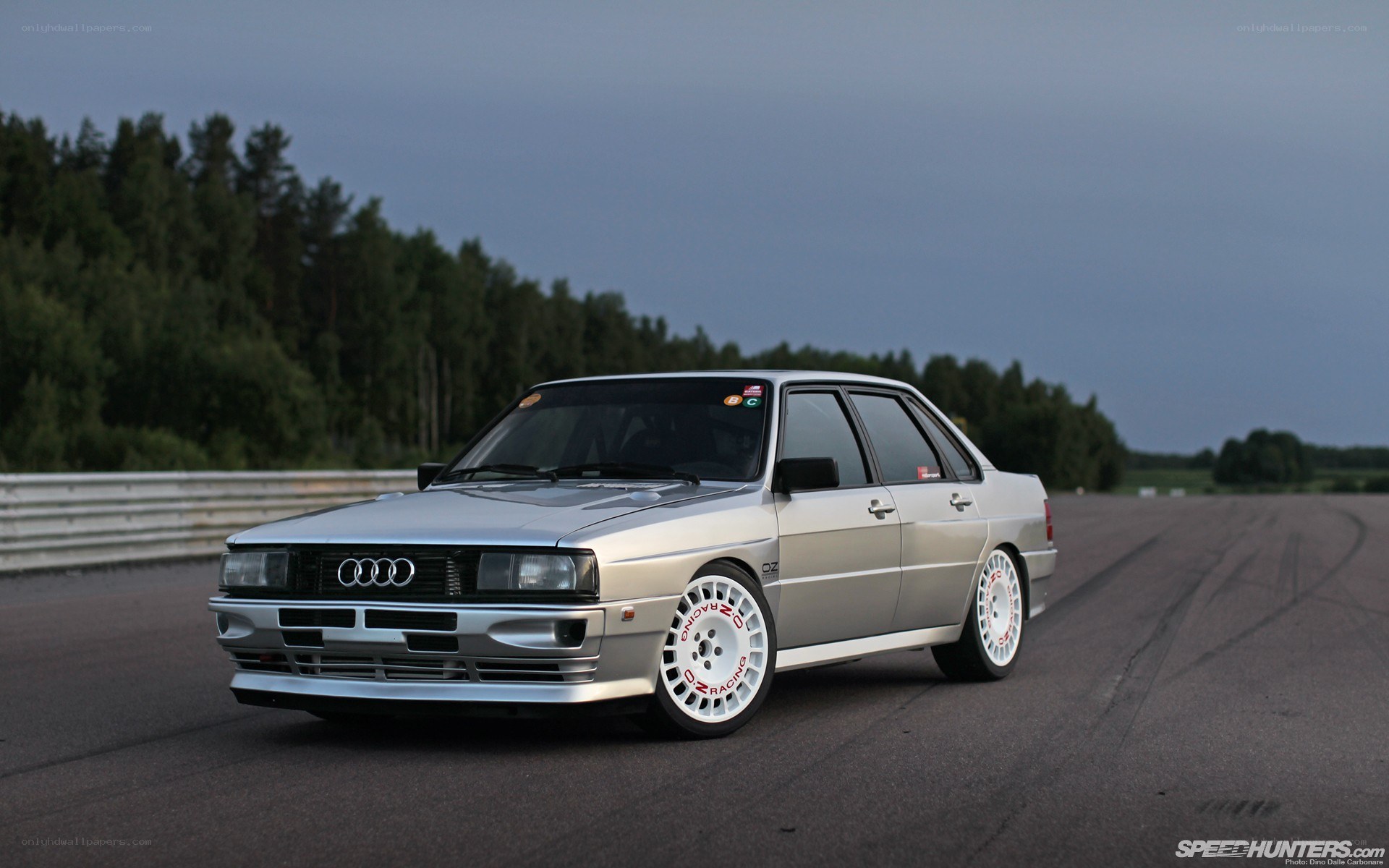 silver audi on a racetrack