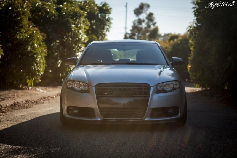 silver audi on a sunlit road