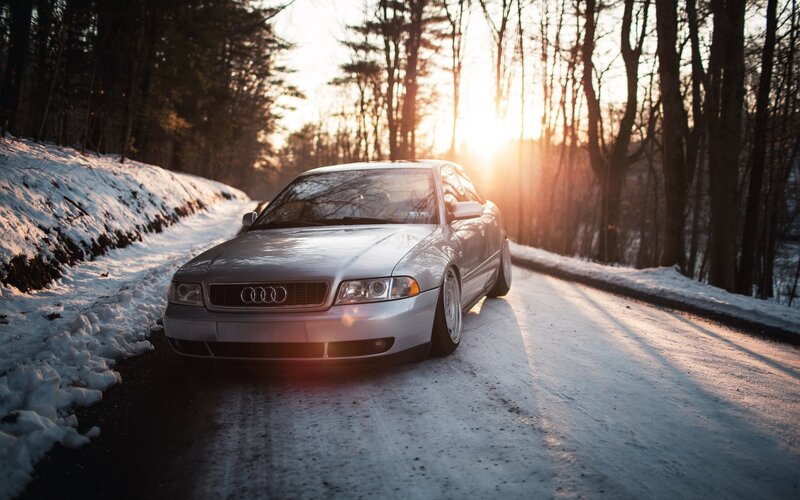 Silver Audi on Snowy Road