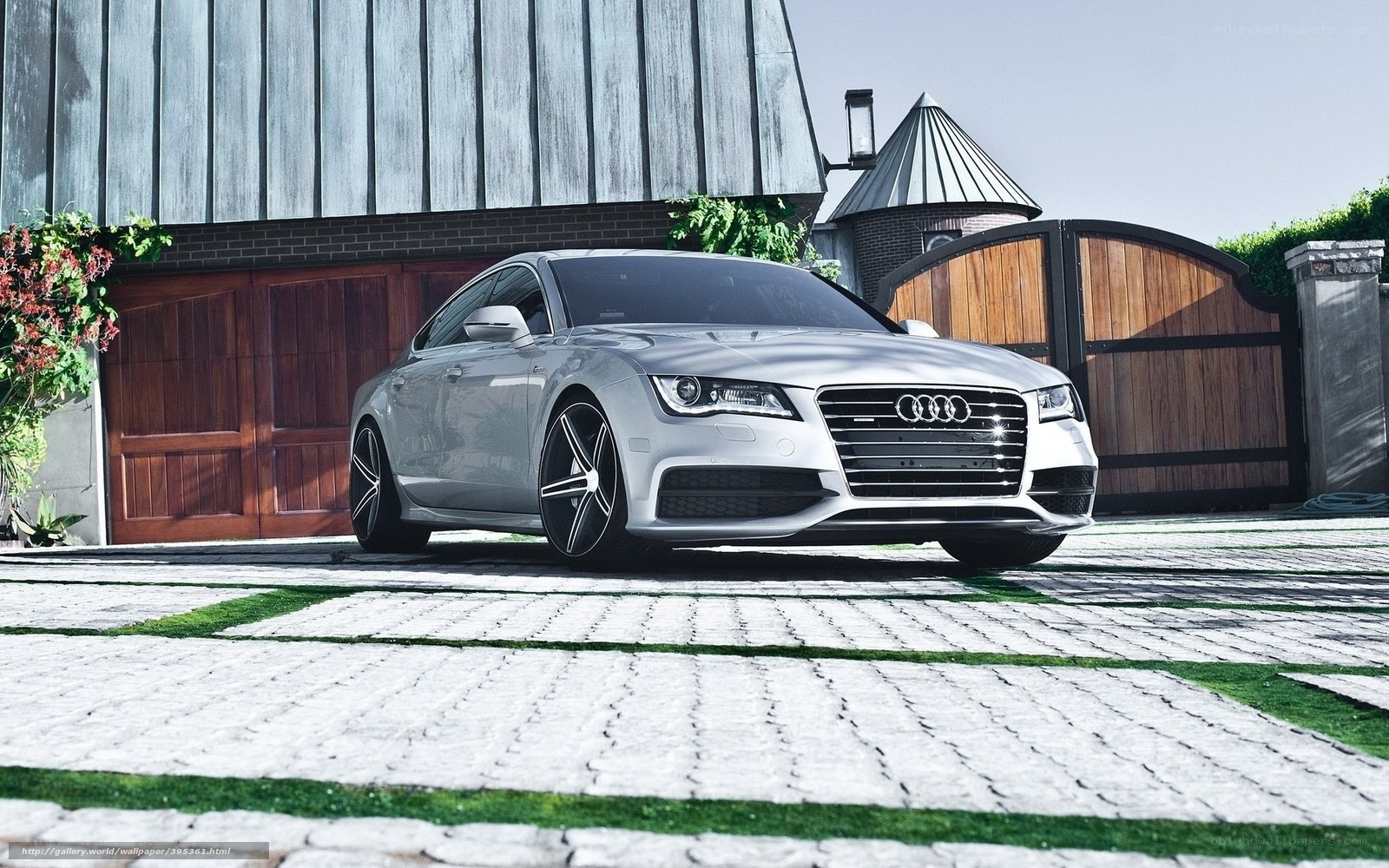 Silver Audi parked in driveway