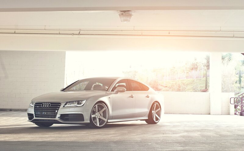 Silver Audi parked in garage