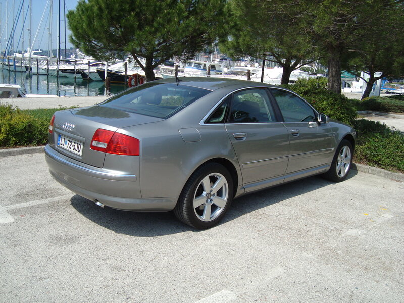silver audi parked near marina