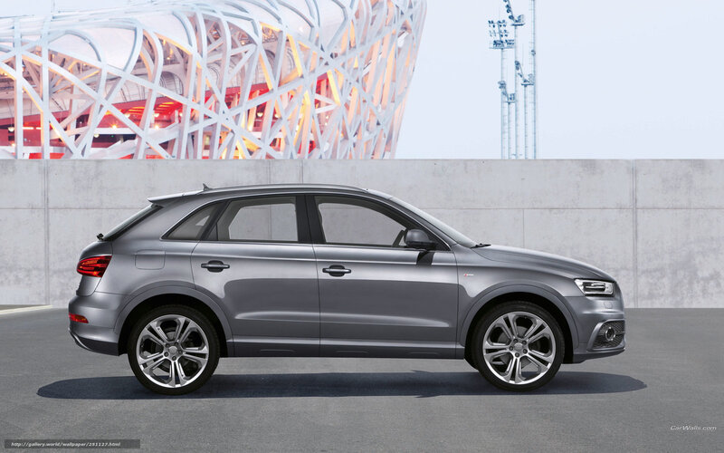 Silver Audi Q3 in front of Bird's Nest