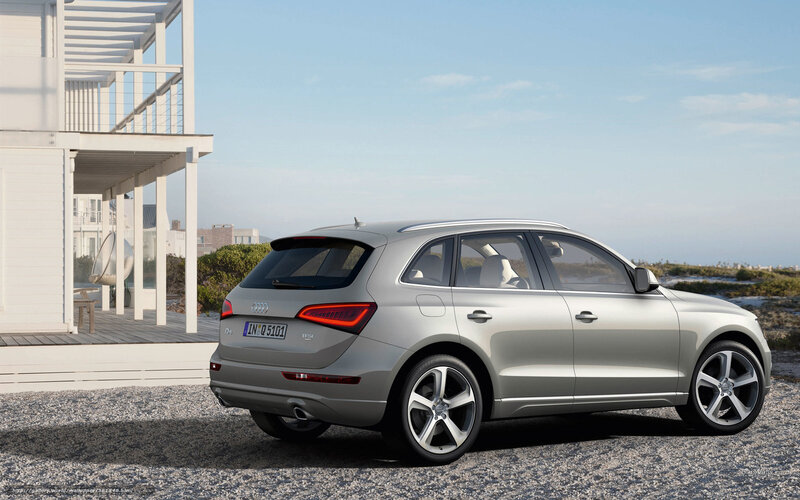 silver audi q5 by the beach