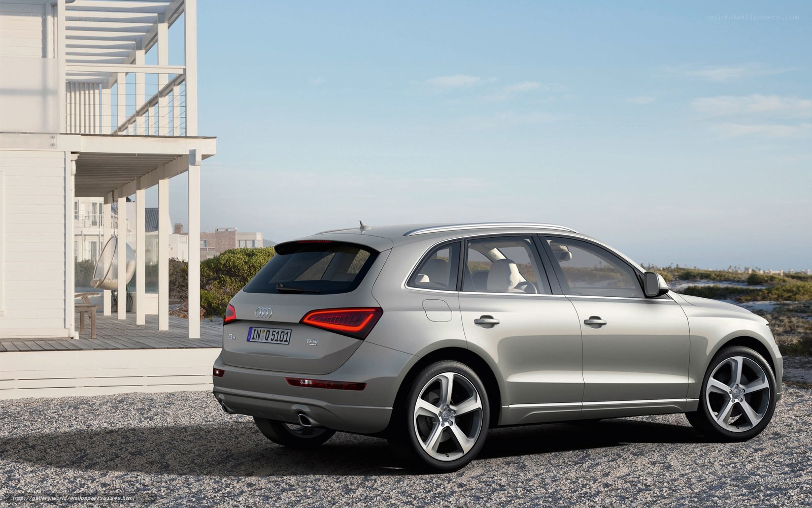 silver audi q5 by the beach