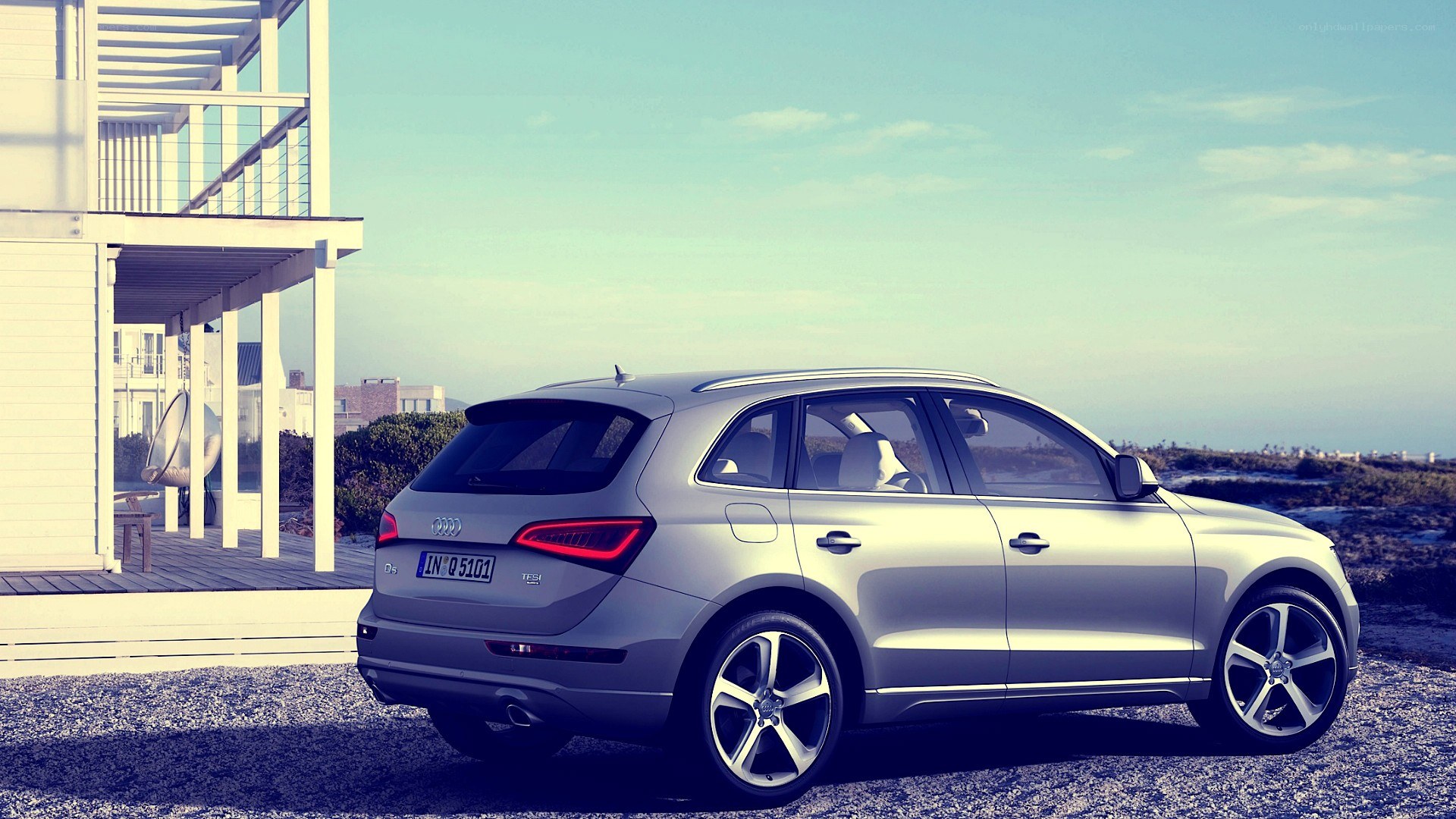Silver Audi Q5 by the coast